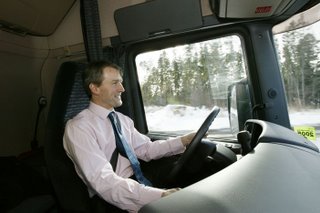 Shadow transport minister Owen Paterson at the wheel