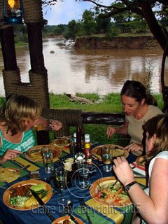 Dining with a croc! A meal on the Mara, Masai Mara, Kenya safari