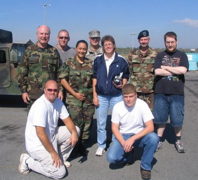 Shown are (left to right, kneeling) students Frank Waybright of Evans and Ted Corbitt of Elizabeth; (second row) Doug Weaver, WVUP faculty member and administrator of the college's Cisco Regional Networking Academy; Tech Sgt. Newton of the Louisiana Air National Guard; Jenny Dawkins, WVUP Assistant Professor of Computer Information/Technology; (third row) student Michael Noland of Parkersburg; Lt. John Davis and Chief Warrant Officer Rick Copley of the WV Army National Guard; and student Tim Rapson of Parkersburg.