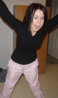 my evil sister blocking the doorway, not letting me out of the bathroom