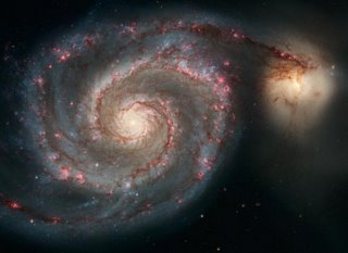 Hubble view of M51 and companion