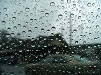 Rainy day, water droplets on the car window