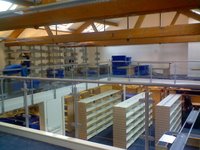 Photograph of the shelving from the mezzanine level
