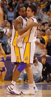 Kobe celebrates with teammate Sasha Vujacic, who by sucking so badly played a big role in Kobe's great performance
