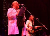 Hawkwind live 2004. I guess they're getting up their in years so it's best to go on stage with your doctor.