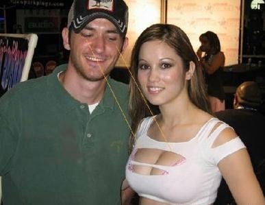 Guy caught staring at woman's boobs.