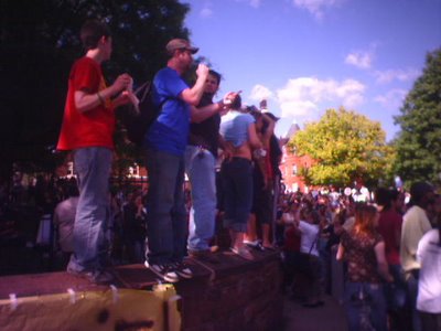 four student leaders addressing crowds of angry protesters
