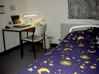 This is my room from my door. You an see my nice new doona (comforter) and my desk with my computer in the background