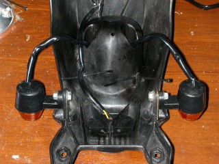 The rear indicators fitted onto mudguard assembly