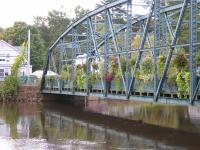 Simsbury, CT -- Footbridge over Farmington River on 10/17/2005, two days after nine days of continuous rain.