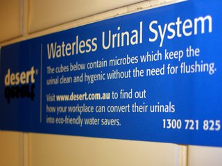 waterless urinal system sign