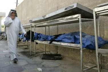Yarmouk morgue - trolleys with the 5 beheaded bodies found in Amiriya Western Baghdad Sept 12th 2006