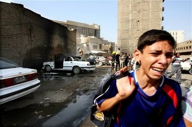 Boy leaving scene of bombing in Qurtuba Square October 12th 2006