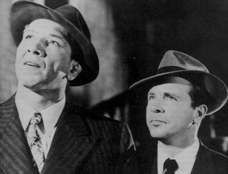 Moose Malloy (Mike Mazurki) and Philip Marlowe (Dick Powell), from 'Murder, My Sweet,' a 1944 film adaption of Chandler's 'Farewell, My Lovely'