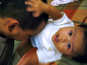 Ayah was down after a game of wrestling with me..heh