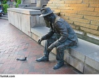 Man feeding a pigeon