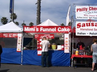 My husband getting us a funnel cake