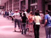 Thousands of volunteers line up to help at the Austin Convention Center Saturday night