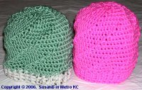 2 crocheted swirl skull caps