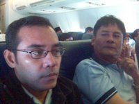 Di atas pesawat : saya dan Tulang Godang yang sering bercanda.