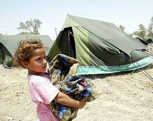 Refugee girl from al-Jihad neighbourhood arrives at refugee camp July 14th 2006