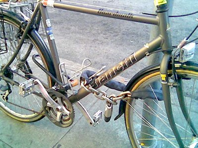 Image of Bianchi bicycle locked to parking meter