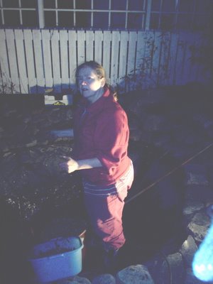 Annikki cleaning the Kampitie pond