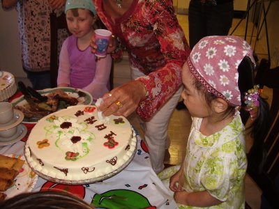 Kaija cuts the birthday cake