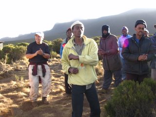 singing porters and one trekker