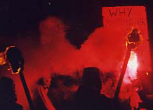 Banner reading 'WHY' at Lewes Bonfire, East Sussex, UK