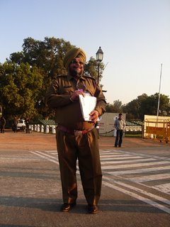 The Portly Policeman. Actually he's trying to hide his potbelly with the file in his hand