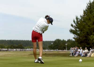 Michelle Wie tees off during the 33rd Curtis Cup Match in Merseyside, England in 2004