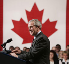 George Bush and a Canadian flag