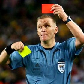Graham Poll with yellow and red card
