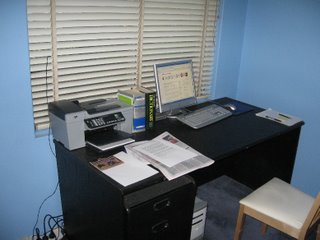 My desk showing the HP Officejet 5610 and the HP Pavilion computer with 17-inch flat-panel display