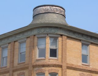 What kind of hat, exactly, looks good on a building like this?