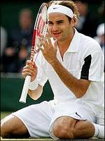 Federer defends Wimbledon