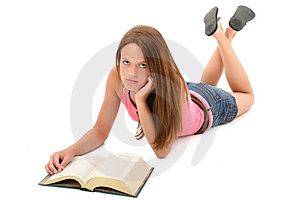 Random 14 year old girl reading a book