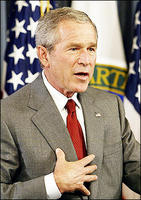 george w. bush mumbles incoherrently about tapping reserves and conserving after being severly confused during a briefing at the department of energy. he said that he would love to capitalize on the losses from the hurricanes, and use them as an excuse to push his pro-energy industry agenda. photo stolen from the ap. take by jim watson