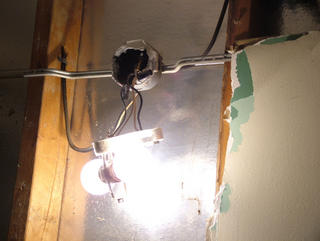 Wow!  I would have thought that a light was screwed to a wall or something.  We are changing this one for safety.