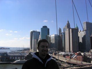 James on the Brooklyn bridge overlooking Downtown & South Street Seaport