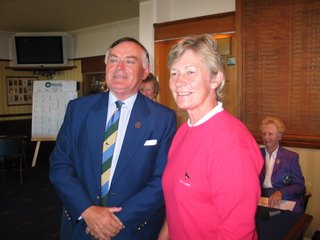 Helen receives her runners up prize from the club captain -- click to enlarge