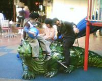 Children playing on the Tuatara in Cuba St
