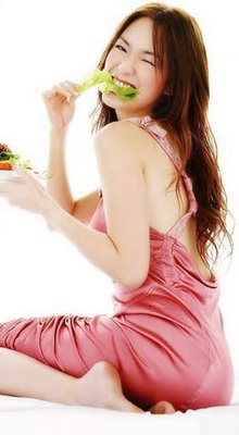 gorgeous singapore girl eating salad