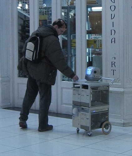 Robot Gossip: Robot Beggar Works for the materially deprived