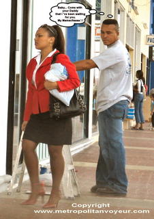 Lusty man sinfully glancing at passing by offic secretary woman in red high heel pumps. Click for larger picture