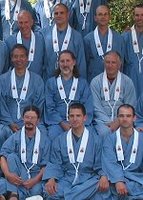 Men from the Western Buddhist Order in their ordination robes