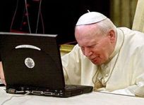 the great john paul II checking his emails ^_^