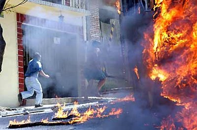 Mark in Mexico, http://markinmexico.blogspot.com/, Palehorse Galleries, http://palehorsemex.vstore.ca/, Oaxaca, Mexico teachers strike, Gunfire and a burning bus a block away from the polling site has forced the suspension of the teachers' vote on returning to work . . . or not, as well as an evacuation of the hotel where the vote was taking place. At the time of the poll's suspension, unofficial word from inside the hotel where the teachers were voting indicated that the vote favored a return to classrooms by a 27,000 to 16,000 vote margin.