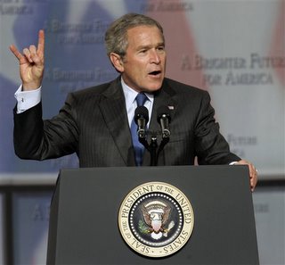 Bush Flashes Devil Sign (Again)